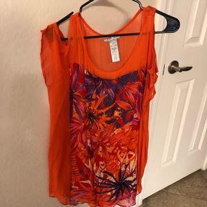 Pretty beaded and colorful top.